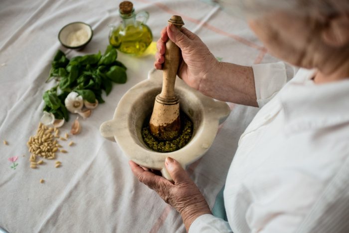 Photo of someone making pesto