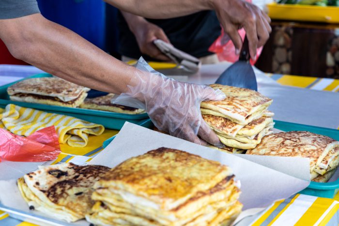 photo of a seller making murtabak