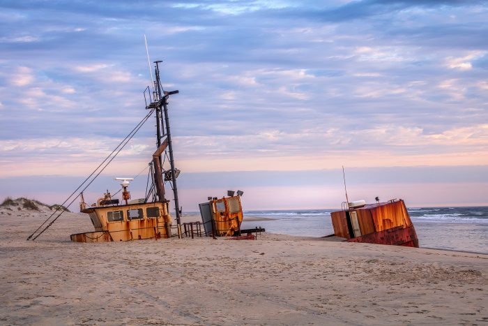 photo of shipwreck on the shore of outer banks